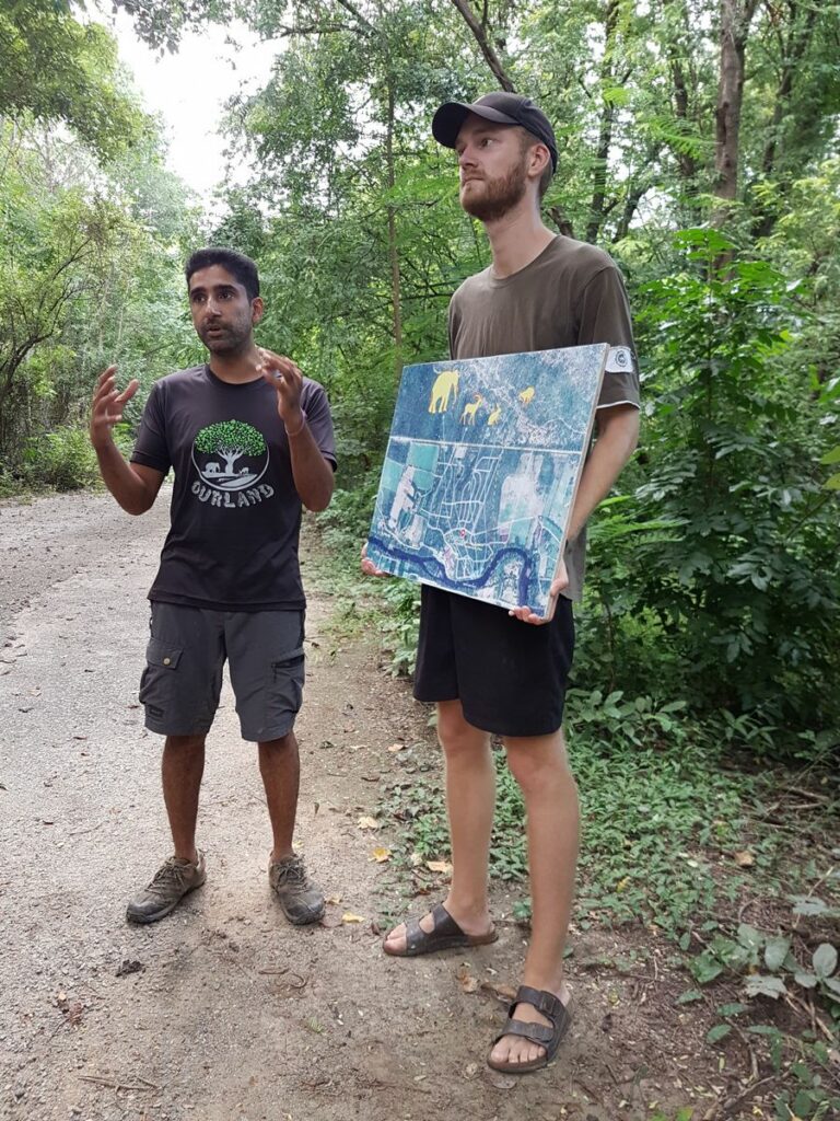 OurLand co-founder Vijo Varghese and an OurLand volunteer in Western Forest Complex, Thailand