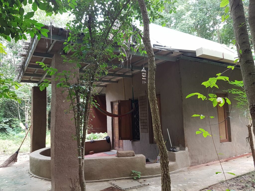 a house from mud at OurLand ecovillage; avoid concrete; use sustainable building material